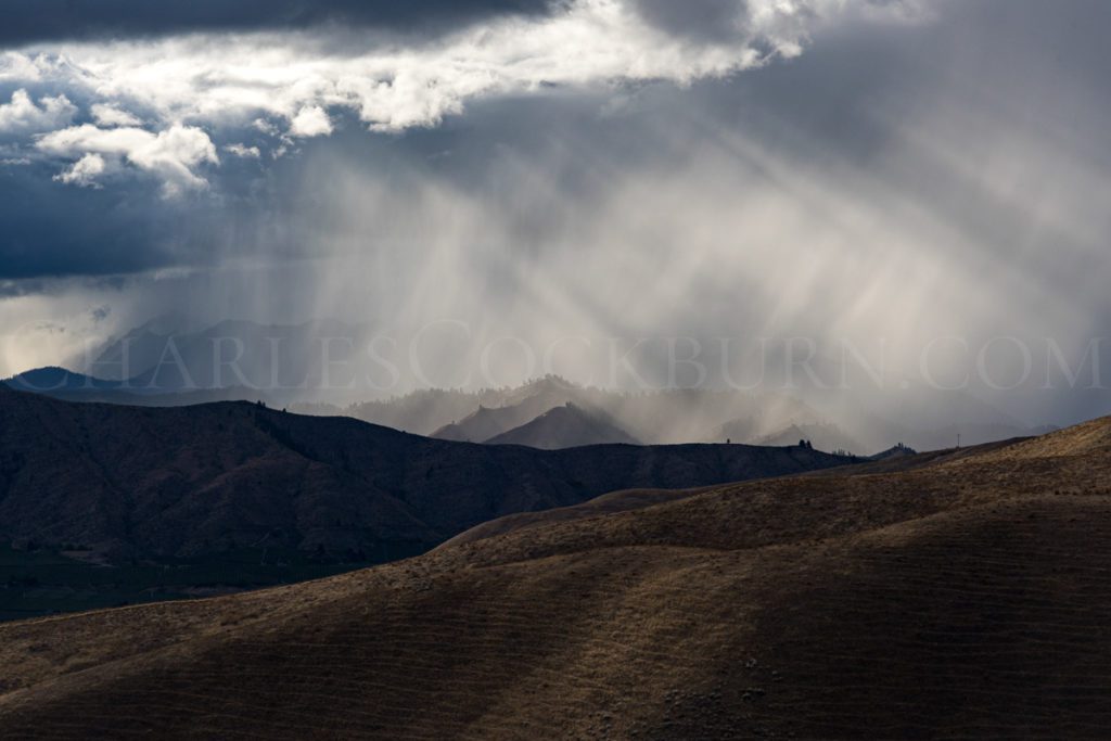 Storm clouds and rain over the Enchantment Mountains near Wenatchee